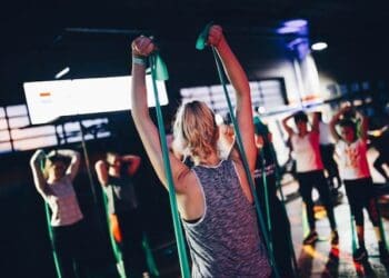 Women using blue resistance band