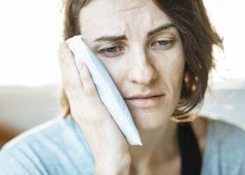 A lady suffering from toothache